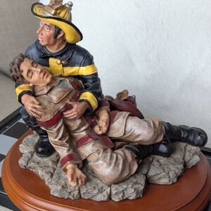 Vintage Vanmark Firefighter and Rescued Figurine